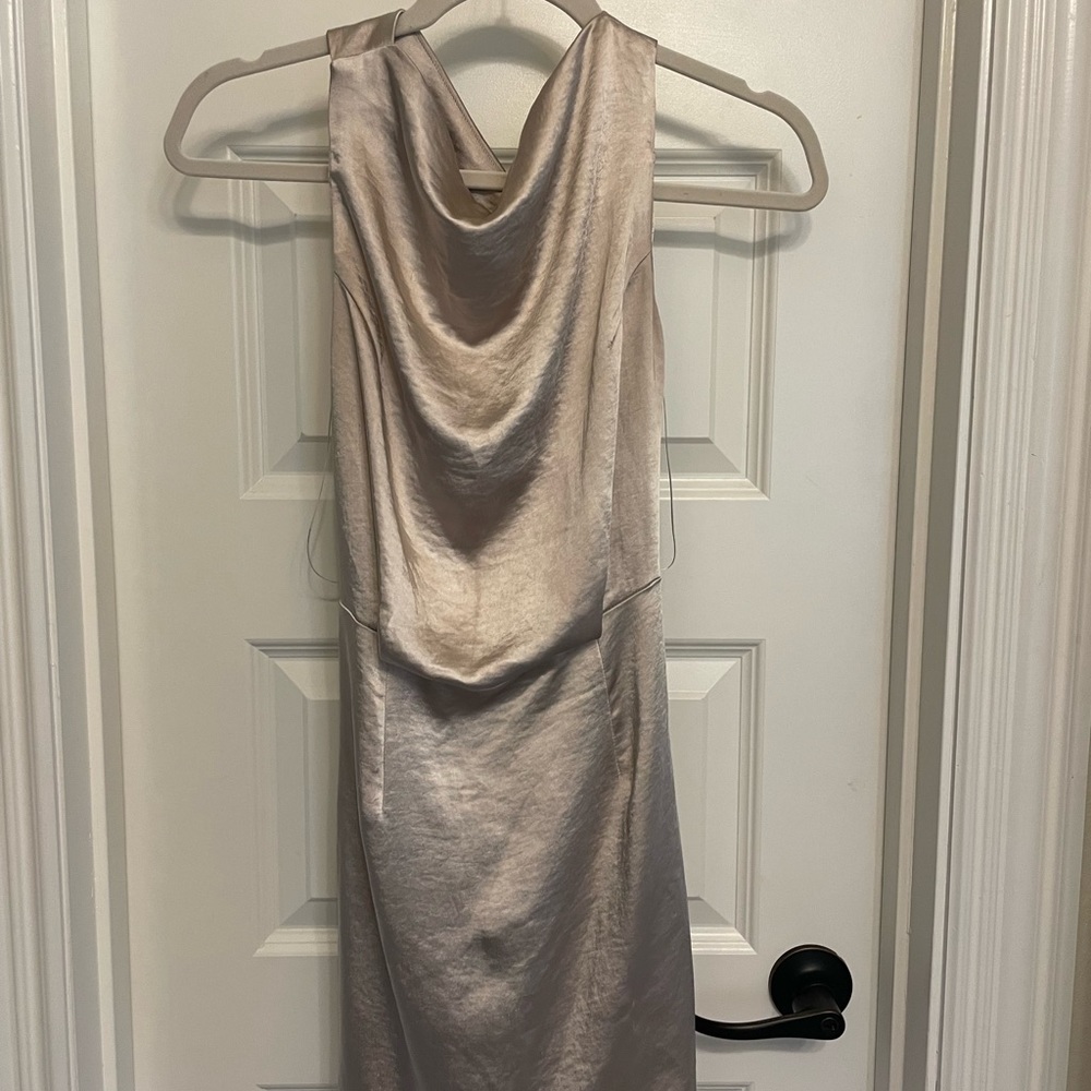 Tan mini dress with cow neck and bodycon skirt